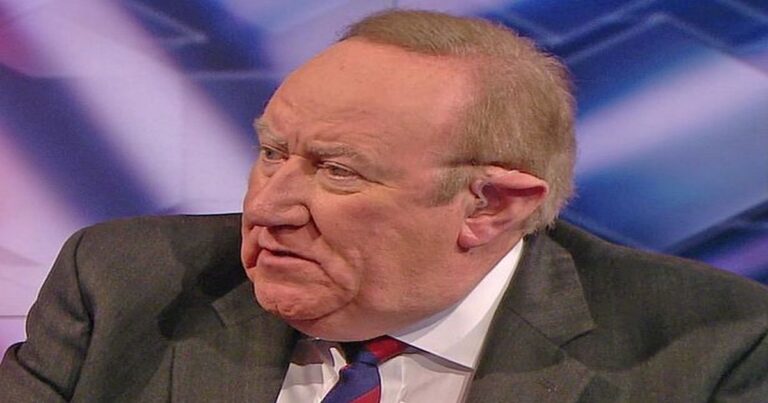Andrew Neil diving for cover!